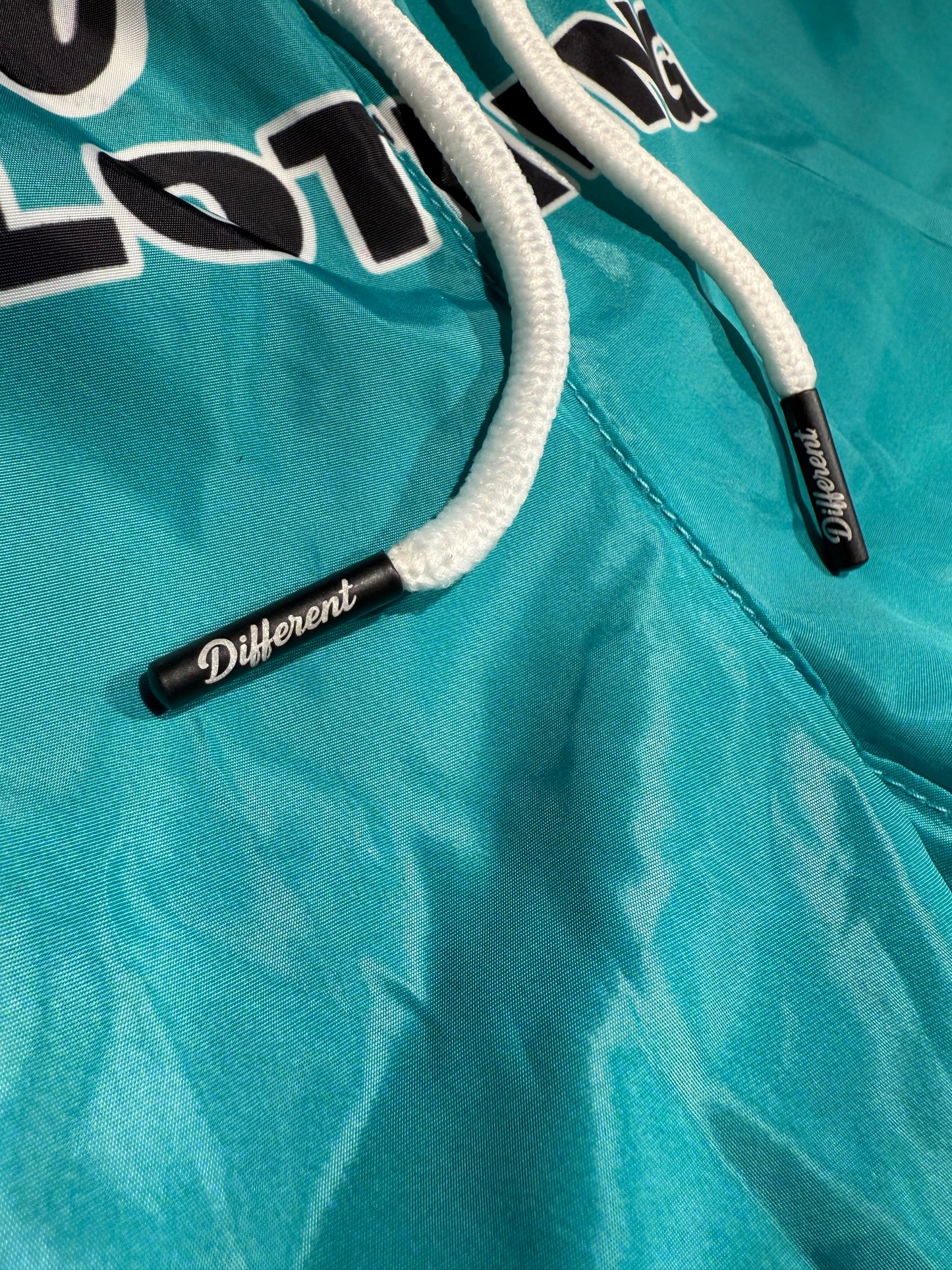 DIFFERENT CLOTHING SWISHY SHORTS GREEN