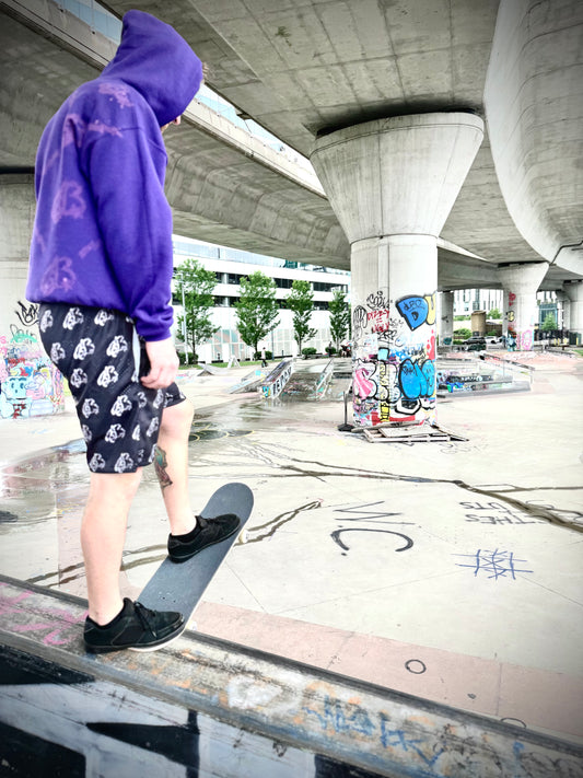 ALL OVER LOGO PRINT SHORTS